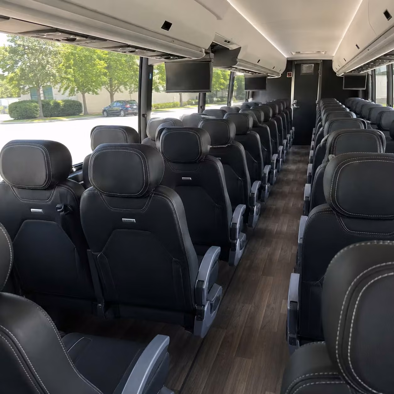 charter bus rentals for federal agency personnel movements near fort snelling